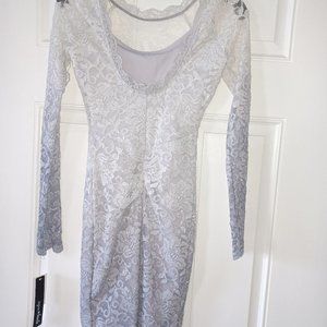 White and silver lace mini dress. Brand new with tags from department store.